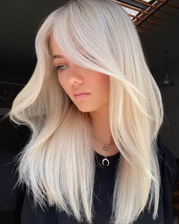 Cheveux blond platine salon Toujours Belle